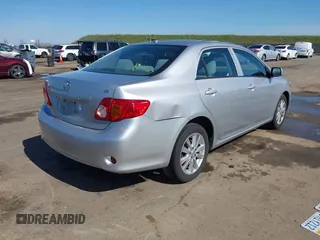 2010 Toyota Corolla with VIN 1NXBU4EE5AZ260859, listed as a IAAI auction lot 41647848 with 129,074 mi miles and . Bid and sale history available at DreamBid. Image 4.