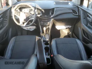 2020 Chevrolet Trax LT z VIN 3GNCJLSB7LL321218, wystawiony jako Copart lot #79774344 z przebiegiem Nie podano mil oraz Szkody całkowita. Historia ofert i sprzedaży dostępna na DreamBid. Obrazek 8.