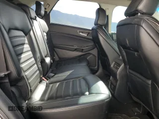 2020 Ford Edge SEL z VIN 2FMPK4J97LBA46310, wystawiony jako Copart lot #56177805 z przebiegiem 97 180 mil mil oraz Szkoda całkowita • Salvage title. Historia ofert i sprzedaży dostępna na DreamBid. Obrazek 11.
