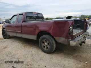 2003 Ford F-150 XL with VIN 1FTRX17L63NA96989, listed as a Copart auction lot 51501945 with 297,669 mi miles and Salvage Title. Bid and sale history available at carsss.com. Image 2.
