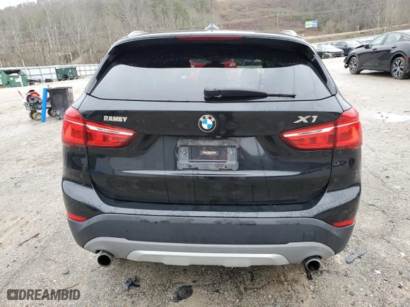 2018 BMW X1 xDrive28i with VIN WBXHT3C34J5F91817, listed as a Copart auction lot 85311514 with 123,638 mi miles and Salvage Title. Bid and sale history available at carsss.com. Image 6.