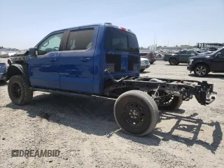 2023 Ford F-150 XL with VIN 1FTFW1E8XPKE23518, listed as a Copart auction lot 60340975 with 11,661 mi miles and Salvage title. Bid and sale history available at DreamBid. Image 2.