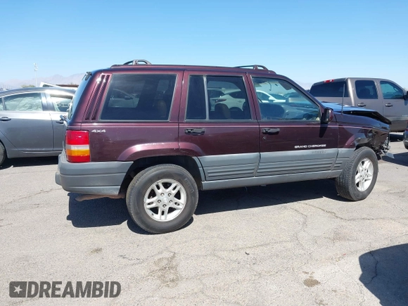 1996 Jeep Grand Cherokee Laredo with VIN 1J4GZ58S3TC391942, listed as a IAAI auction lot 41711778 with 202,765 mi miles. Bid and sale history available at carsss.com. Image 14.
