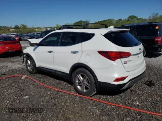 2018 Hyundai Santa Fe 2.4L with VIN 5XYZU3LB6JG511556, listed as a Copart auction lot 52035015 with 85,177 mi miles and Salvage title. Bid and sale history available at DreamBid. Image 2.