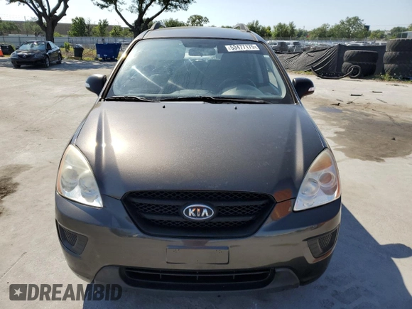 2010 Kia Rondo LX with VIN KNAHG8C84A7299898, listed as a Copart auction lot 53477175 with 127,990 mi miles and Salvage Title. Bid and sale history available at carsss.com. Image 5.