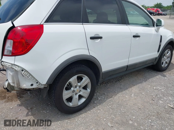 2014 Chevrolet Captiva Sport LS z VIN 3GNAL2EK2ES621832, wystawiony jako IAAI lot #42246539 z przebiegiem 73 788 mil mil oraz . Historia ofert i sprzedaży dostępna na DreamBid. Obrazek 4.