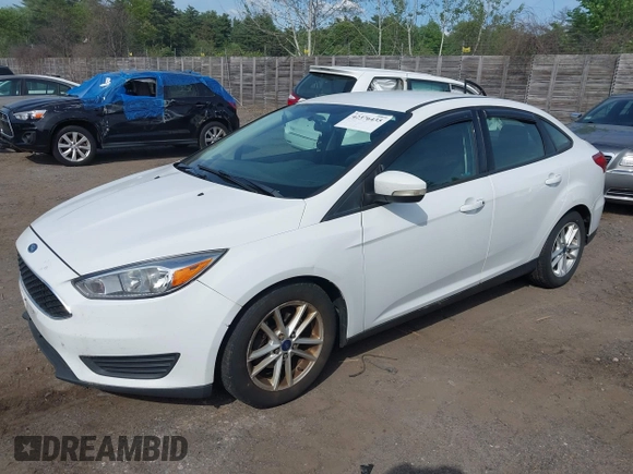 2016 Ford Focus SE with VIN 1FADP3F27GL248431, listed as a IAAI auction lot 42376435 with 173,731 mi miles and . Bid and sale history available at DreamBid. Image 2.