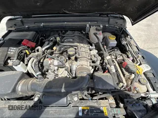 2023 Jeep Wrangler Sport S with VIN 1C4HJXDG2PW615754, listed as a Copart auction lot 53884255 with 34,427 mi miles and Clean Title. Bid and sale history available at DreamBid. Image 7.