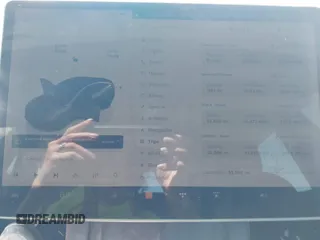 2022 Tesla Model 3 Long Range z VIN 5YJ3E1EB6NF260118, wystawiony jako IAAI lot #42139962 z przebiegiem 52 566 mil mil oraz . Historia ofert i sprzedaży dostępna na DreamBid. Obrazek 7.