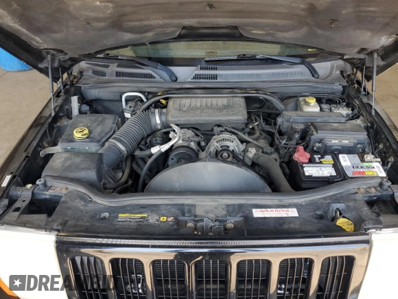 2006 Jeep Commander z VIN 1J8HG48K16C195599, wystawiony jako Copart lot #59402935 z przebiegiem 184 157 mil mil oraz Szkoda całkowita • Salvage title. Historia ofert i sprzedaży dostępna na DreamBid. Obrazek 11.