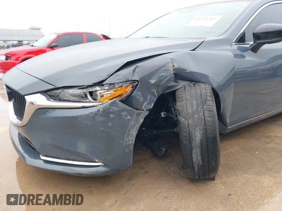 2021 Mazda 6 Carbon Edition with VIN JM1GL1WY0M1600414, listed as a IAAI auction lot 41551393 with 36,780 mi miles and . Bid and sale history available at DreamBid. Image 6.