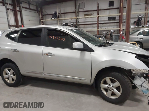 2013 Nissan Rogue S with VIN JN8AS5MV3DW661921, listed as a IAAI auction lot 41975303 with 116,929 mi miles and . Bid and sale history available at DreamBid. Image 14.