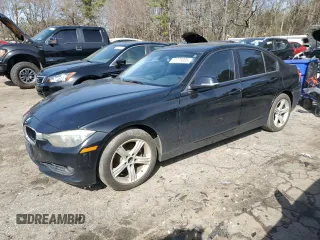 2015 BMW 3 Series 328i with VIN WBA3C1C58FK119720, listed as a Copart auction lot 47779005 with 129,673 mi miles and Salvage Title. Bid and sale history available at carsss.com. Image 1.