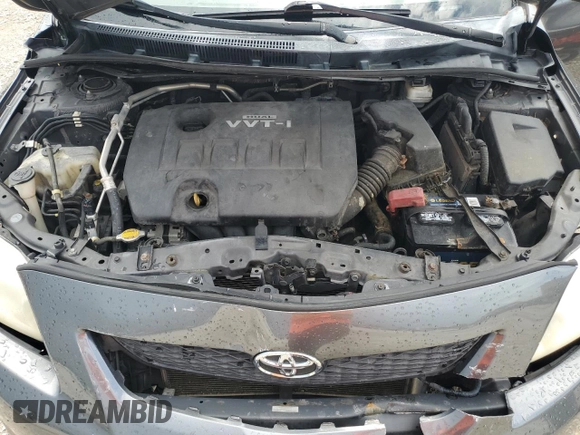 2010 Toyota Corolla with VIN 1NXBU4EE2AZ352883, listed as a Copart auction lot 63660205 with 131,039 mi miles and Salvage title. Bid and sale history available at DreamBid. Image 11.