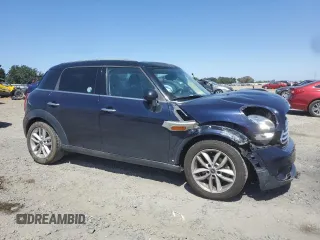 2013 MINI Countryman with VIN WMWZB3C50DWR36081, listed as a Copart auction lot 57513875 with 78,199 mi miles and Salvage title. Bid and sale history available at DreamBid. Image 4.