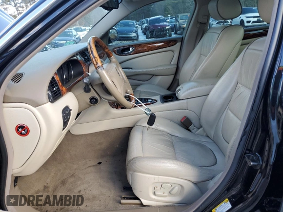 2004 Jaguar XJ with VIN SAJEA74C14SG01576, listed as a Copart auction lot 46955735 with 99,322 mi miles and Clean Title. Bid and sale history available at DreamBid. Image 7.