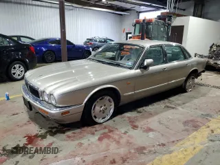 1997 Jaguar XJ z VIN SAJHX1249VC802431, wystawiony jako Copart lot #56226735 z przebiegiem 90 678 mil mil oraz Szkoda całkowita • Salvage title. Historia ofert i sprzedaży dostępna na DreamBid. Obrazek 1.