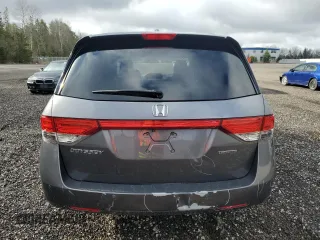 2014 Honda Odyssey Touring z VIN 5FNRL5H98EB512144, wystawiony jako Copart lot #69987533 z przebiegiem 184 231 mil mil oraz Szkoda całkowita • Salvage title. Historia ofert i sprzedaży dostępna na DreamBid. Obrazek 6.