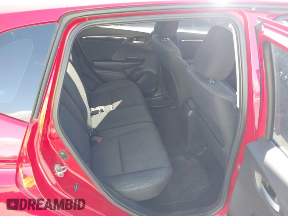 2015 Honda Fit EX-L z VIN 3HGGK5H84FM761279, wystawiony jako IAAI lot #40911141 z przebiegiem 82 217 mil mil oraz . Historia ofert i sprzedaży dostępna na DreamBid. Obrazek 8.