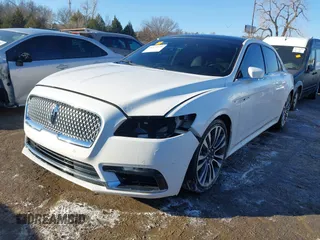 2017 Lincoln Continental Reserve with VIN 1LN6L9RP4H5609432, listed as a IAAI auction lot 41274549 with 104,742 mi miles. Bid and sale history available at carsss.com. Image 2.