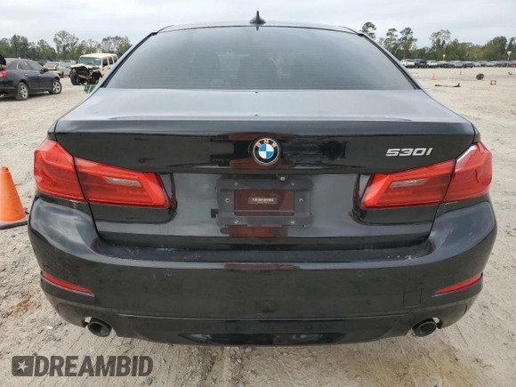 2018 BMW 5 Series 530i with VIN WBAJA5C54JG899845, listed as a Copart auction lot 83007584 with 57,379 mi miles and Salvage Title. Bid and sale history available at DreamBid. Image 6.