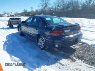 2004 Pontiac Grand Am SE with VIN 1G2NE52F24M692805, listed as a IAAI auction lot 41591014 with 137,072 mi miles. Bid and sale history available at carsss.com. Image 3.