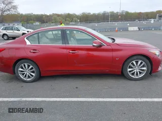 2014 Infiniti Q50 Sport with VIN JN1BV7AR1EM701939, listed as a IAAI auction lot 42051058 with 142,258 mi miles and . Bid and sale history available at DreamBid. Image 13.
