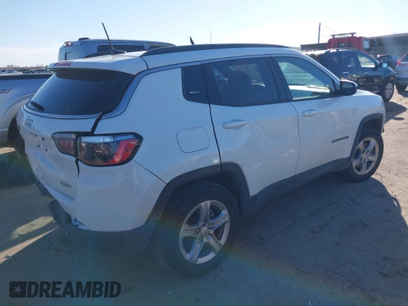 2023 Jeep Compass Latitude with VIN 3C4NJDBN9PT506040, listed as a IAAI auction lot 41483552 with 24,009 mi miles and . Bid and sale history available at DreamBid. Image 4.