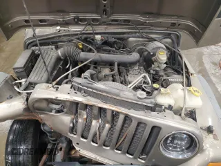 2004 Jeep Wrangler X z VIN 1J4FA39S64P789243, wystawiony jako Copart lot #56286185 z przebiegiem Nie podano mil oraz Nie do naprawy • Non repairable. Historia ofert i sprzedaży dostępna na DreamBid. Obrazek 12.