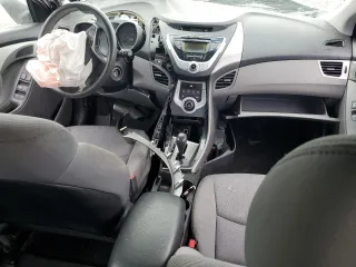 2012 Hyundai Elantra GLS с VIN KMHDH4AE5CU397144, выставлен на аукционе Copart как лот 57083355 с пробегом Не указан миль и Списание • Salvage title. История ставок и продаж доступна на DreamBid. Изображение 8.