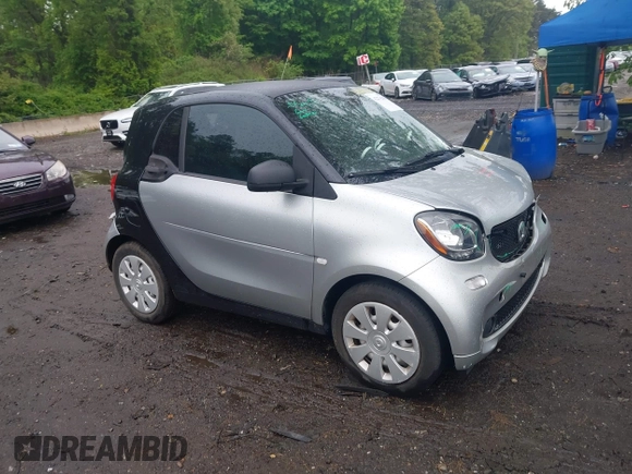 2016 Smart fortwo Passion z VIN WMEFJ5DA3GK055906, wystawiony jako IAAI lot #42274280 z przebiegiem 29 070 mil mil oraz . Historia ofert i sprzedaży dostępna na DreamBid. Obrazek 1.
