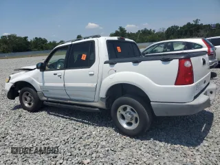 2002 Ford Explorer Sport Trac Value with VIN 1FMZU67E12UB93878, listed as a Copart auction lot 56306785 with 159,476 mi miles and Salvage title. Bid and sale history available at DreamBid. Image 2.