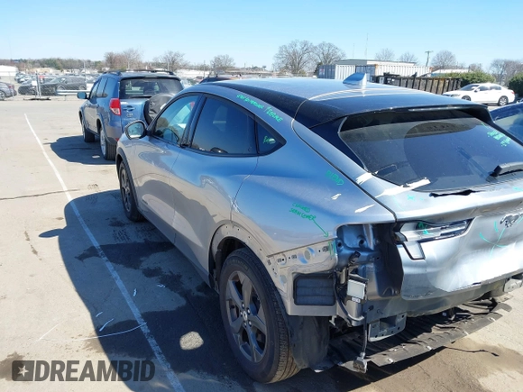 2021 Ford Mustang Mach-E Select z VIN 3FMTK1RM3MMA07686, wystawiony jako IAAI lot #41702088 z przebiegiem 26 158 mil mil oraz . Historia ofert i sprzedaży dostępna na DreamBid. Obrazek 3.