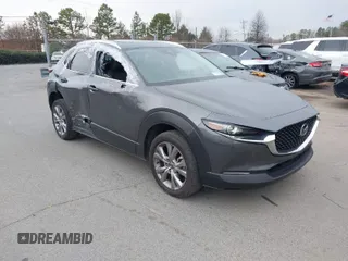 2022 Mazda CX-30 S Premium with VIN 3MVDMBDL9NM434619, listed as a IAAI auction lot 41620655 with 46,557 mi miles and . Bid and sale history available at carsss.com. Image 1.