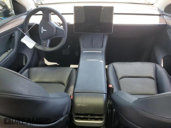 2024 Tesla Model Y Long Range with VIN 7SAYGDEE0RF123793, listed as a Copart auction lot 57177305 with 20,053 mi miles and Salvage title. Bid and sale history available at DreamBid. Image 8.