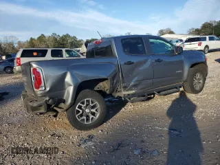 2021 GMC Canyon 4WD AT4 w/Leather with VIN 1GTG6FEN7M1156069, listed as a Copart auction lot 89345225 with 66,164 mi miles and Salvage Title. Bid and sale history available at carsss.com. Image 3.