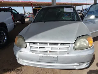 2003 Hyundai Accent GL with VIN KMHCG45C93U476176, listed as a IAAI auction lot 41940608 with 212,264 mi miles. Bid and sale history available at carsss.com. Image 6.