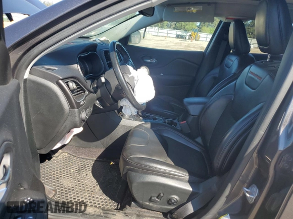 2019 Jeep Cherokee Trailhawk with VIN 1C4PJMBX1KD207294, listed as a Copart auction lot 72694824 with 93,311 mi miles and Salvage Title. Bid and sale history available at DreamBid. Image 7.