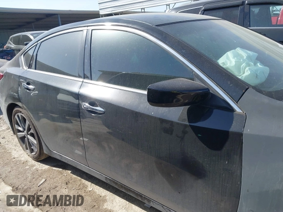 2018 Nissan Altima 2.5 SR with VIN 1N4AL3AP4JC284490, listed as a IAAI auction lot 41795563 with 112,936 mi miles. Bid and sale history available at carsss.com. Image 13.