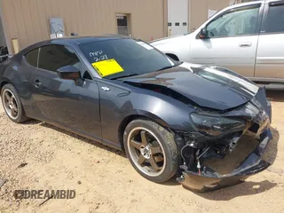 2016 Scion FR-S with VIN JF1ZNAA13G9702833, listed as a IAAI auction lot 41795687 with 71,161 mi miles and . Bid and sale history available at carsss.com. Image 1.