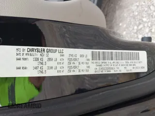 2013 Dodge Grand Caravan SXT with VIN 2C4RDGCG9DR599814, listed as a IAAI auction lot 42168424 with 173,413 mi miles and . Bid and sale history available at DreamBid. Image 9.
