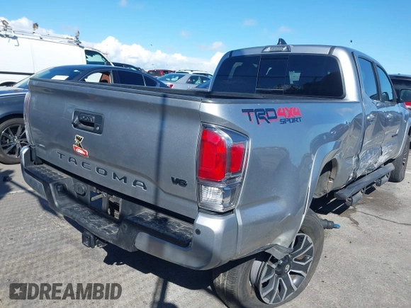 2022 Toyota Tacoma SR5 with VIN 3TMDZ5BN6NM122590, listed as a IAAI auction lot 41714578 with 56,472 mi miles and . Bid and sale history available at DreamBid. Image 4.