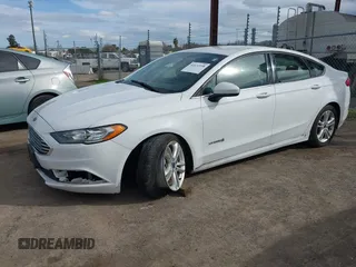 2018 Ford Fusion SE z VIN 3FA6P0LU5JR188171, wystawiony jako IAAI lot #41632358 z przebiegiem 73 677 mil mil oraz . Historia ofert i sprzedaży dostępna na DreamBid. Obrazek 2.