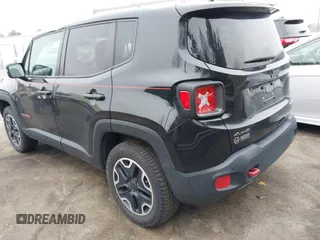 2015 Jeep Renegade Trailhawk with VIN ZACCJBCT0FPC45038, listed as a IAAI auction lot 41796152 with 91,456 mi miles and . Bid and sale history available at DreamBid. Image 3.