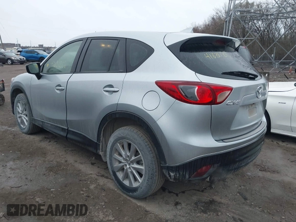 2016 Mazda CX-5 Sport with VIN JM3KE2BY5G0647715, listed as a IAAI auction lot 41831228 with 89,689 mi miles and . Bid and sale history available at DreamBid. Image 3.
