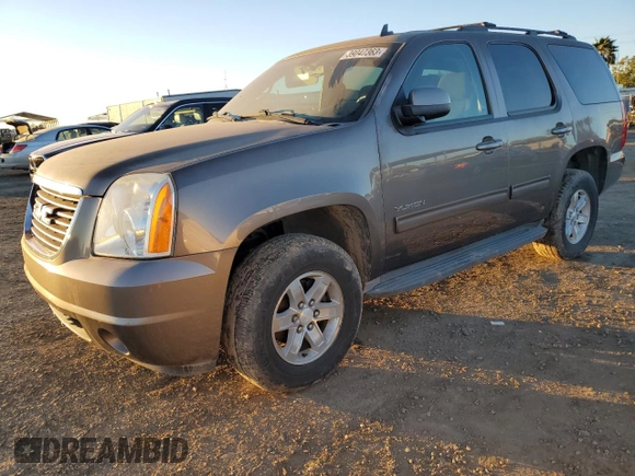 2013 GMC Yukon SLE with VIN 1GKS1AE05DR313734, listed as a Copart auction lot 39047363 with 97,303 mi miles and Salvage Title. Bid and sale history available at carsss.com. Image 1.