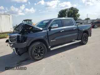 2020 Ram 1500 Laramie with VIN 1C6SRFJT2LN217803, listed as a Copart auction lot 61390795 with 82,172 mi miles and Salvage title. Bid and sale history available at DreamBid. Image 1.