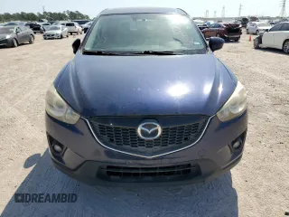 2013 Mazda CX-5 Grand Touring with VIN JM3KE2DE4D0147902, listed as a Copart auction lot 52696685 with 331,168 mi miles and Clean Title. Bid and sale history available at carsss.com. Image 5.