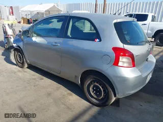 2008 Toyota Yaris with VIN JTDJT923885191561, listed as a IAAI auction lot 42018083 with 228,090 mi miles. Bid and sale history available at carsss.com. Image 3.