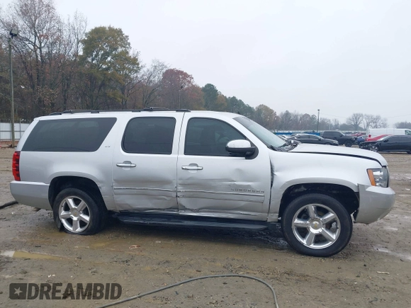 2014 Chevrolet Suburban LTZ with VIN 1GNSCKE05ER173446, listed as a IAAI auction lot 41047096 with 189,049 mi miles and . Bid and sale history available at DreamBid. Image 14.